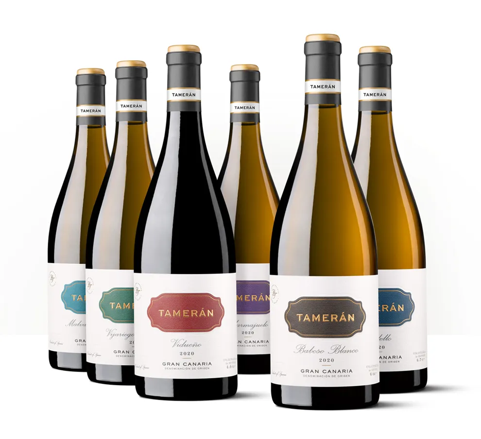 Siluetas de seis botellas de Tamerán, vinos blancos y tinto con etiquetas de distintos colores para identificar cada variedad.